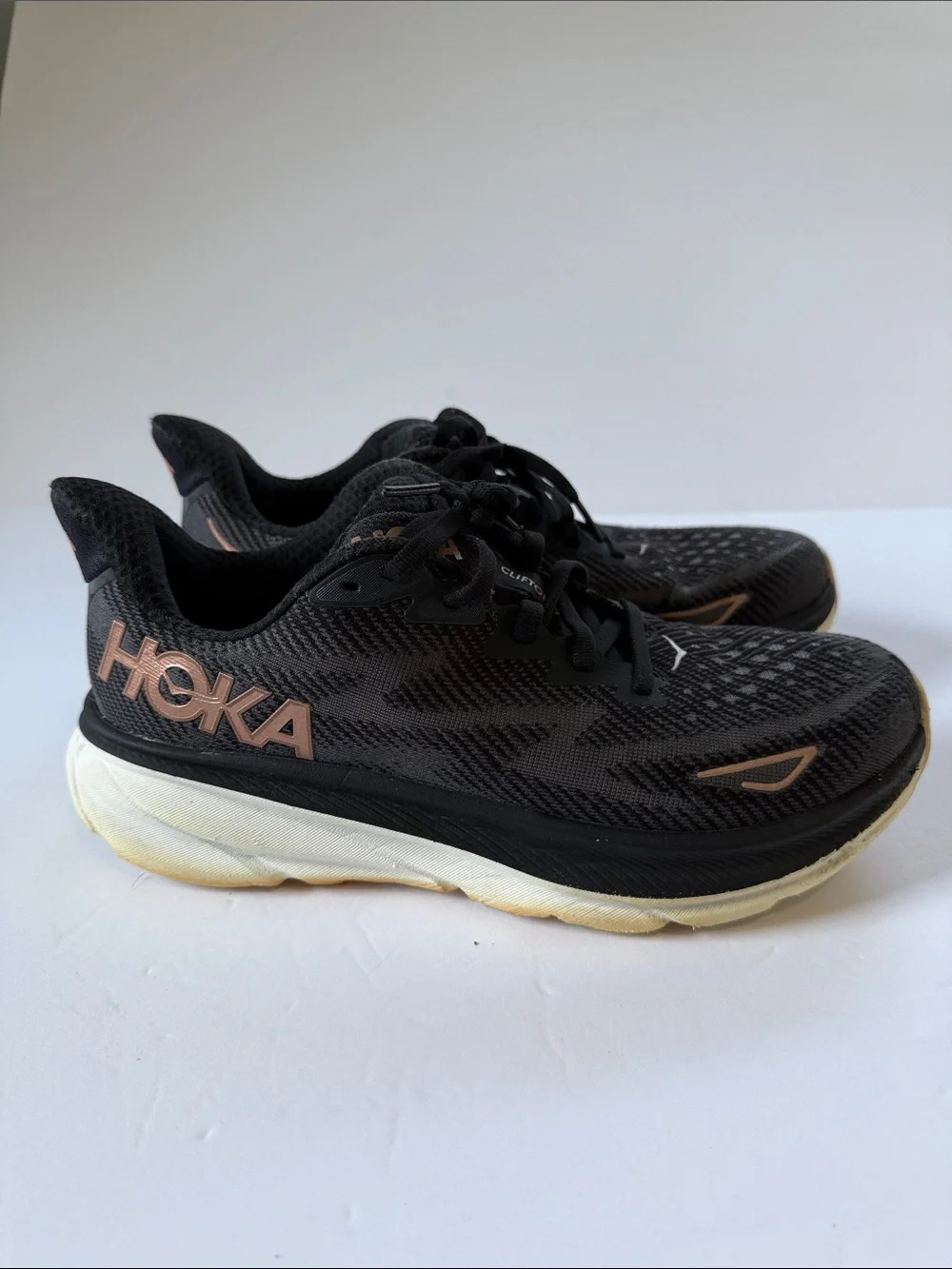 Hoka Women's Black Athletic Shoes with Rose Gold Logo